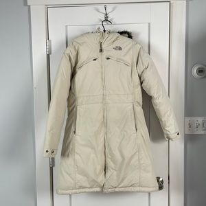 Womens size large North Face down coat. Below knees, lined hood, off white